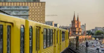 Train running through the city