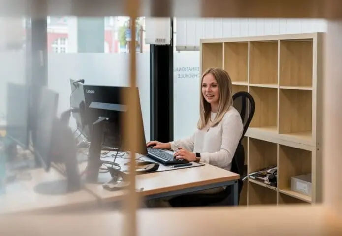 Happy Teacher in her office