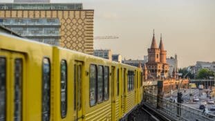 Train running through the city